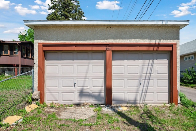 1264 Snelling Ave N, Saint Paul, MN 55108 - detached garage featuring fence