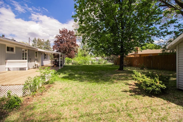 view of yard featuring a wooden deck