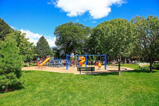 community play area with a lawn