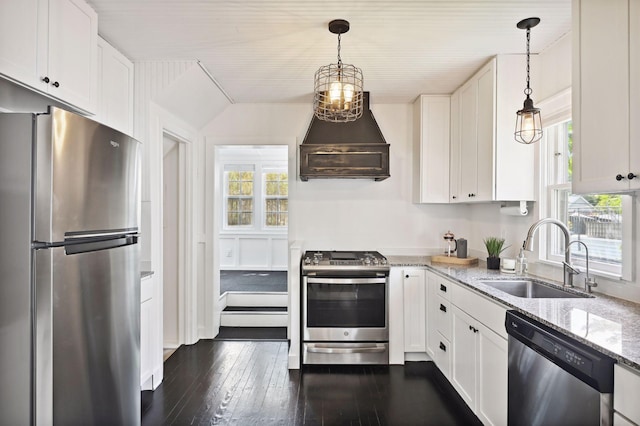 3937 Ewing Ave S, Minneapolis, MN 55410 - kitchen with stainless steel appliances, healthy amount of natural light, white cabinets, and light stone counters
