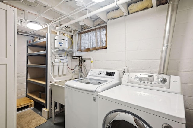 3937 Ewing Ave S, Minneapolis, MN 55410 - laundry room with independent washer and dryer and concrete block wall