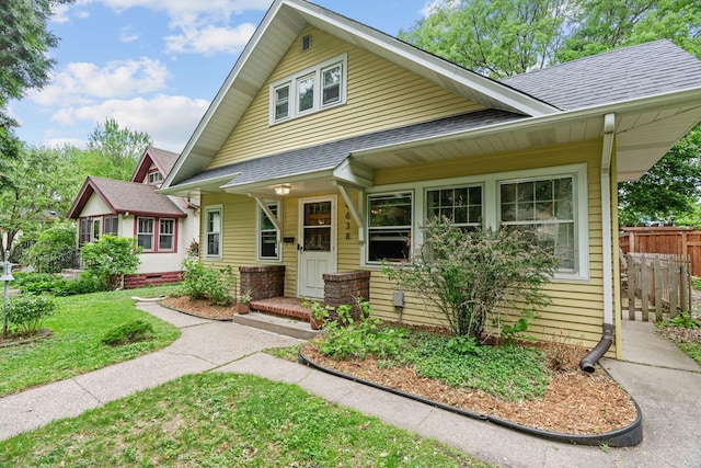 bungalow with roof with shingles
