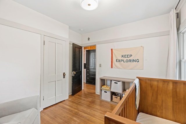 bedroom with light wood-style floors