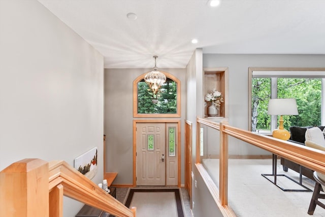 2270 Manning Trl N, Lake Elmo, MN 55042 - foyer entrance featuring a chandelier, baseboards, and recessed lighting
