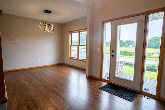 13320 Cedar Ave, Apple Valley, MN 55124 - foyer featuring wood finished floors and a chandelier