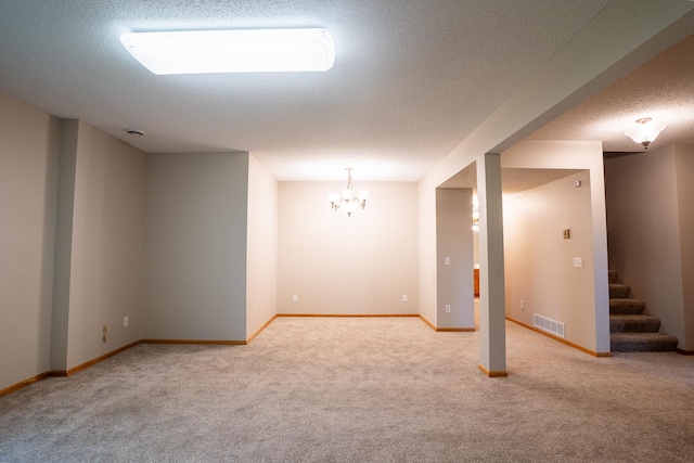 13320 Cedar Ave, Apple Valley, MN 55124 - unfurnished room featuring carpet flooring, a textured ceiling, a chandelier, and stairway