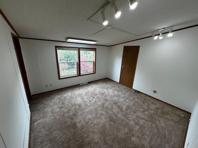 326 5th St NE, Crosby, MN 56441 - empty room featuring a textured ceiling and carpet floors