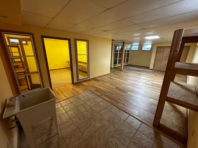 326 5th St NE, Crosby, MN 56441 - unfurnished room with a drop ceiling and wood finished floors