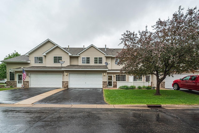 17366 River Birch Ln, Prior Lake, MN 55372 - view of front facade featuring driveway, a garage, a front yard, and roof with shingles