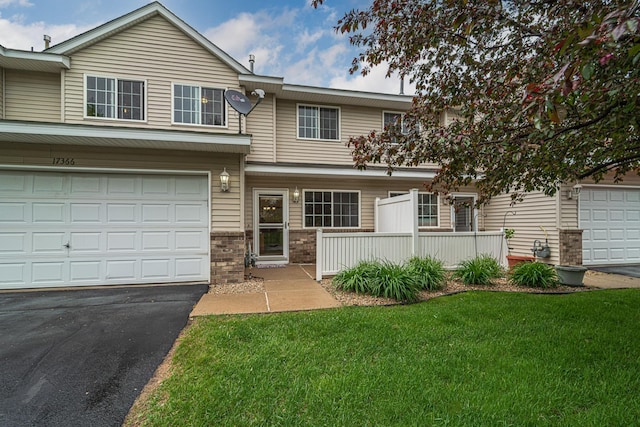 17366 River Birch Ln, Prior Lake, MN 55372 - view of front of house with driveway, a front lawn, and brick siding