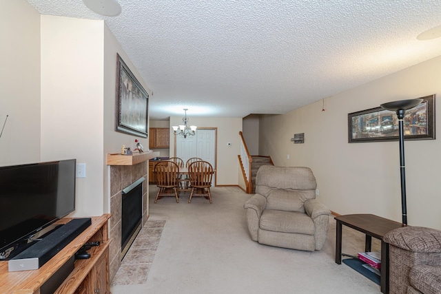 17366 River Birch Ln, Prior Lake, MN 55372 - living room featuring light carpet, a textured ceiling, stairs, and a chandelier