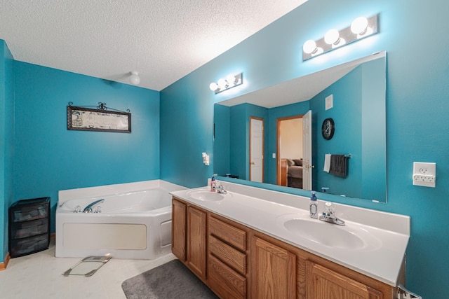 17366 River Birch Ln, Prior Lake, MN 55372 - bathroom with a garden tub, a textured ceiling, and double vanity