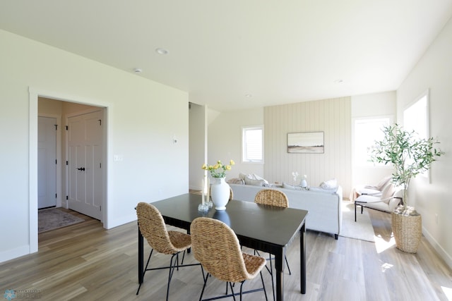 1182 Jill Dr W, West Fargo, ND 58078 - dining space with light wood-style flooring and baseboards