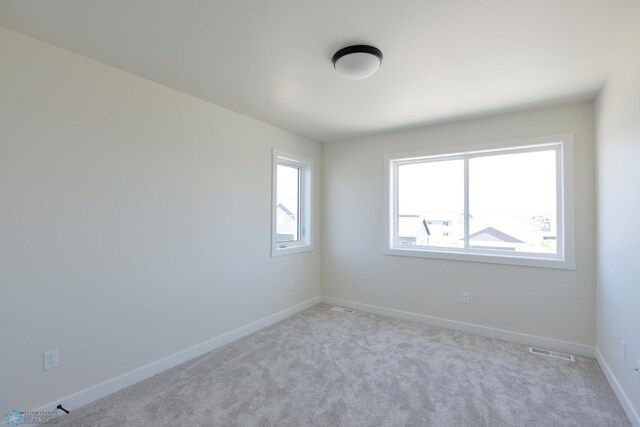 1182 Jill Dr W, West Fargo, ND 58078 - carpeted empty room with baseboards