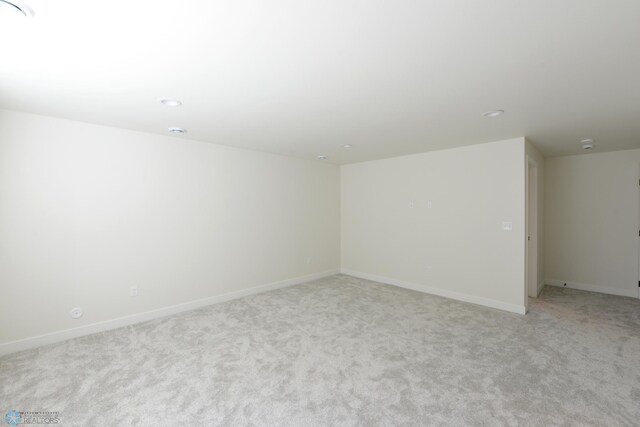 1182 Jill Dr W, West Fargo, ND 58078 - empty room with recessed lighting, light colored carpet, and baseboards