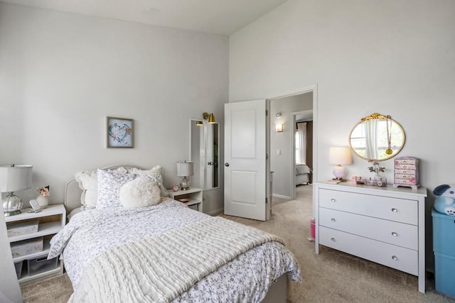 1715 Livingston Ave Unit A, West Saint Paul, MN 55118 - bedroom with light carpet and high vaulted ceiling