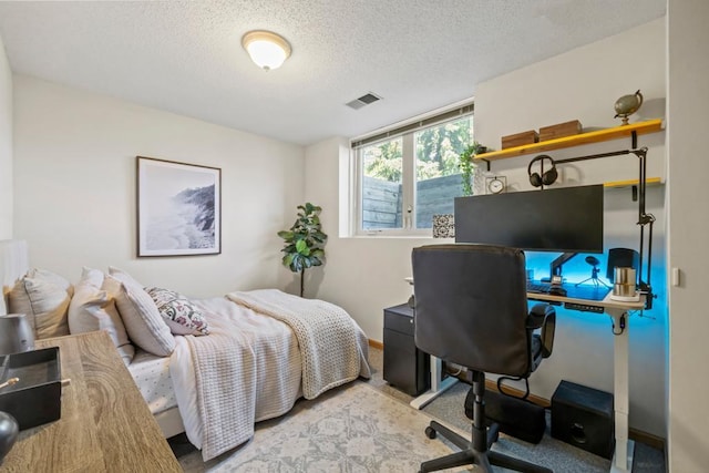 1715 Livingston Ave Unit A, West Saint Paul, MN 55118 - bedroom with a desk, a textured ceiling, and baseboards