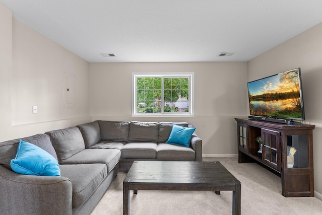 903 3rd Ave SW, Isanti, MN 55040 - living room featuring light carpet, electric panel, and baseboards