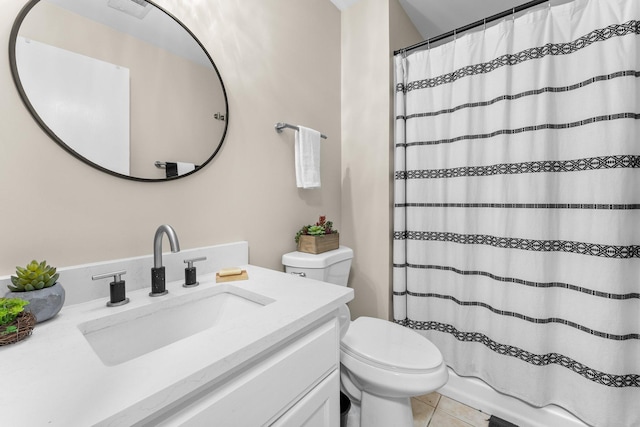 903 3rd Ave SW, Isanti, MN 55040 - bathroom featuring toilet, vanity, tile patterned flooring, and a shower with shower curtain