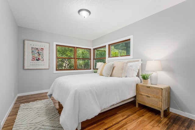 1805 Melrose Ave, Saint Louis Park, MN 55426 - bedroom with baseboards and wood finished floors