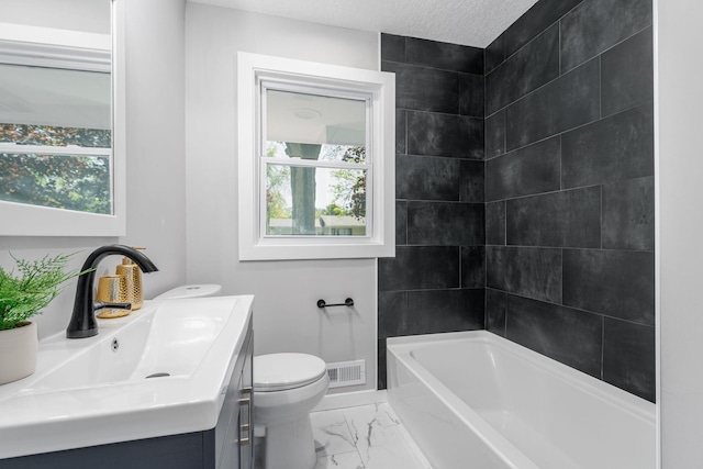 1805 Melrose Ave, Saint Louis Park, MN 55426 - full bath with toilet, marble finish floors, a tub to relax in, vanity, and a shower