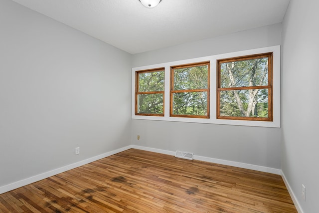1805 Melrose Ave, Saint Louis Park, MN 55426 - spare room with wood finished floors and baseboards
