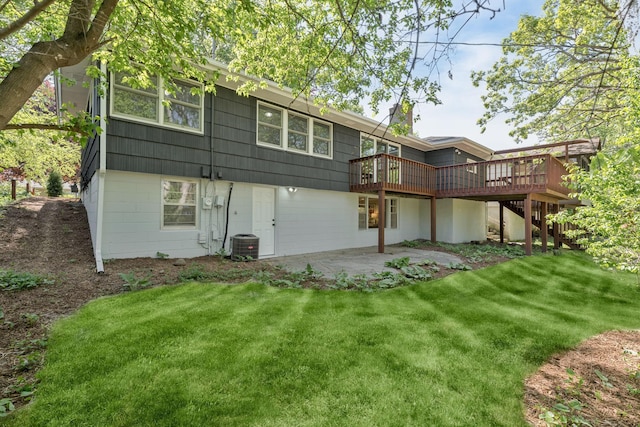 1805 Melrose Ave, Saint Louis Park, MN 55426 - back of property featuring a wooden deck, a yard, stairs, a patio area, and central AC