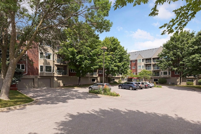 32 11th Ave S Unit 204, Hopkins, MN 55343 - view of asphalt street with street lights and curbs