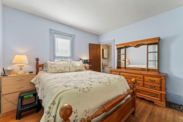 37726 2nd Ave, Dennison, MN 55018 - bedroom featuring dark wood-style flooring