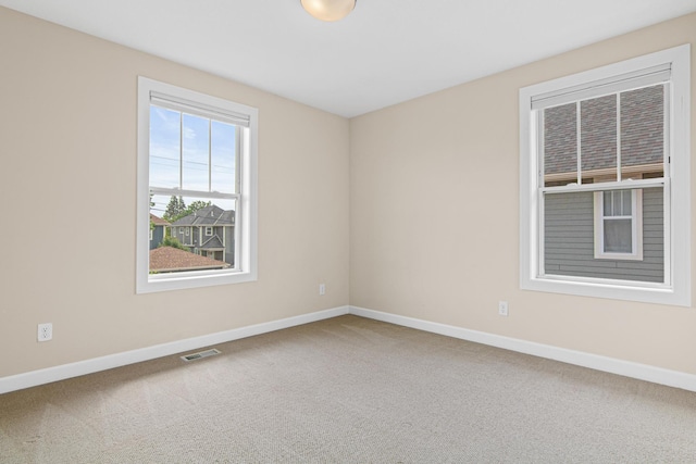 5024 Humboldt Ln N, Minneapolis, MN 55430 - carpeted spare room featuring baseboards