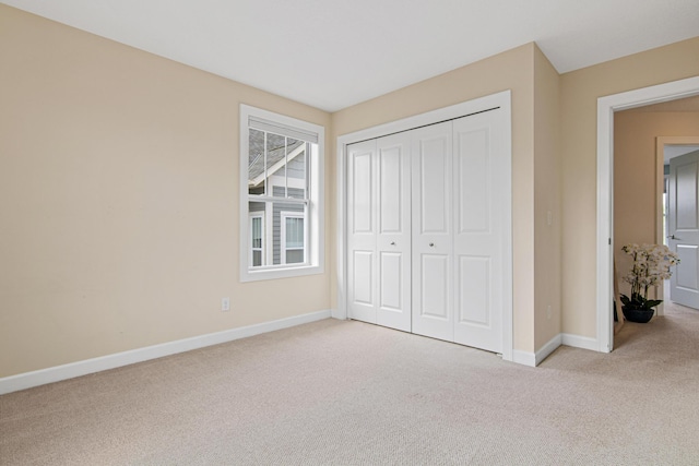 5024 Humboldt Ln N, Minneapolis, MN 55430 - unfurnished bedroom with carpet floors, baseboards, and a closet