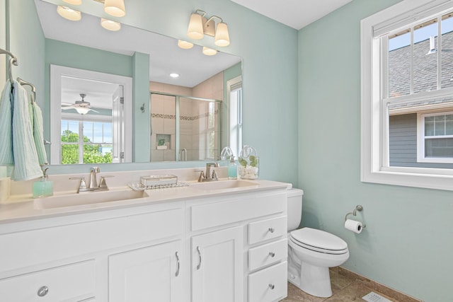 5024 Humboldt Ln N, Minneapolis, MN 55430 - full bath featuring a stall shower, healthy amount of natural light, toilet, and double vanity