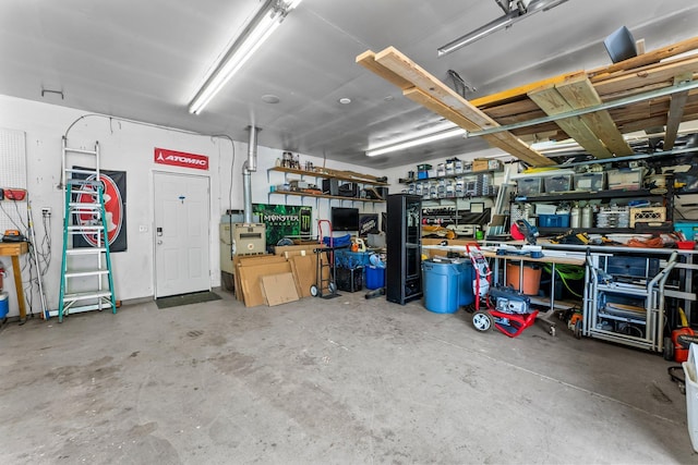 2308 Crosstown Blvd NE, Ham Lake, MN 55304 - garage featuring a workshop area