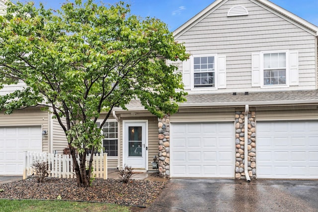 1963 Bluestem Ln, Shoreview, MN 55126 - view of front of property with asphalt driveway, a shingled roof, and an attached garage