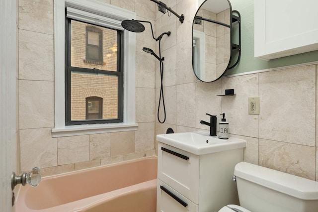 1820 1st Ave S Unit 201, Minneapolis, MN 55403 - bathroom featuring toilet, tile walls, shower / washtub combination, and vanity