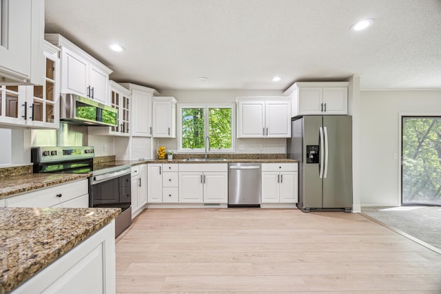 1588 Chatham Ave, Arden Hills, MN 55112 - kitchen featuring appliances with stainless steel finishes, a sink, healthy amount of natural light, white cabinetry, and recessed lighting