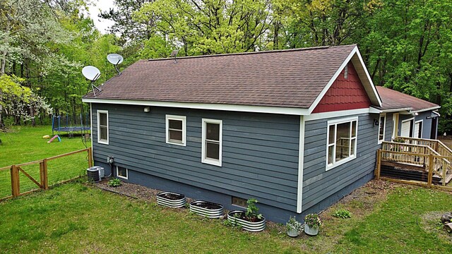 36974 320th St, Aitkin, MN 56431 - view of home's exterior featuring a trampoline and a shingled roof