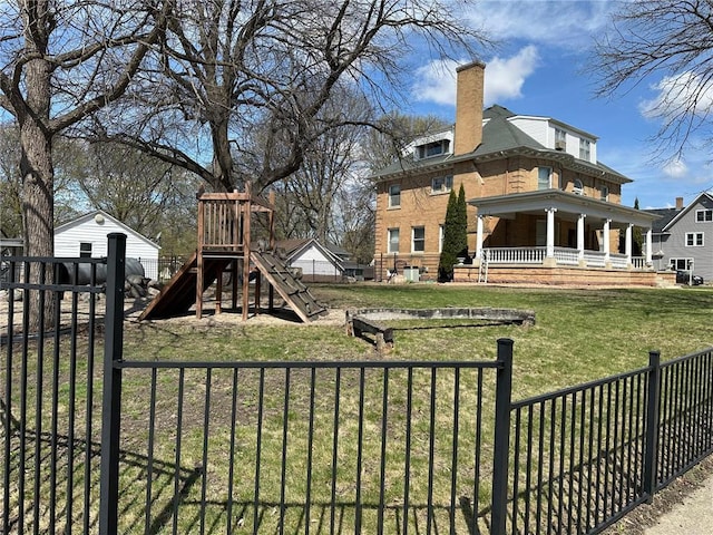 215 5th St S, Montevideo, MN 56265 - view of yard with covered porch and a playground