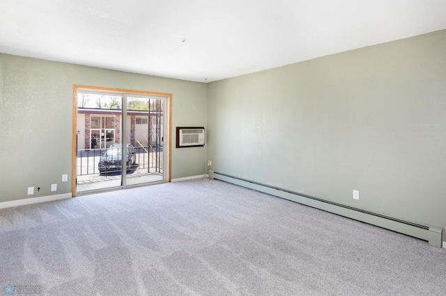 carpeted empty room featuring baseboard heating, a wall mounted AC, and baseboards