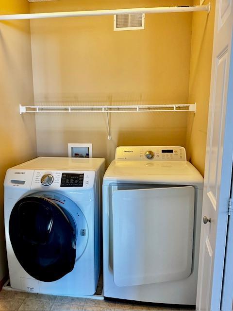 4947 Emmit Dr N Unit 4, Hugo, MN 55038 - laundry area featuring washer and dryer