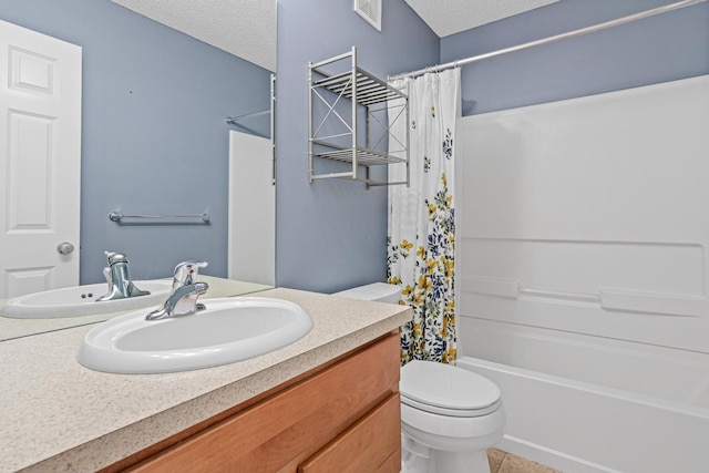 4947 Emmit Dr N Unit 4, Hugo, MN 55038 - bathroom featuring vanity, toilet, a textured ceiling, shower / tub combo, and tile patterned floors