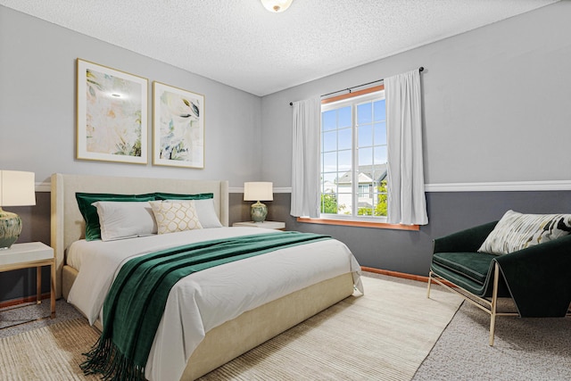 4947 Emmit Dr N Unit 4, Hugo, MN 55038 - carpeted bedroom featuring a textured ceiling and baseboards