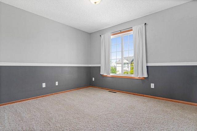 4947 Emmit Dr N Unit 4, Hugo, MN 55038 - empty room featuring carpet floors, a textured ceiling, and baseboards