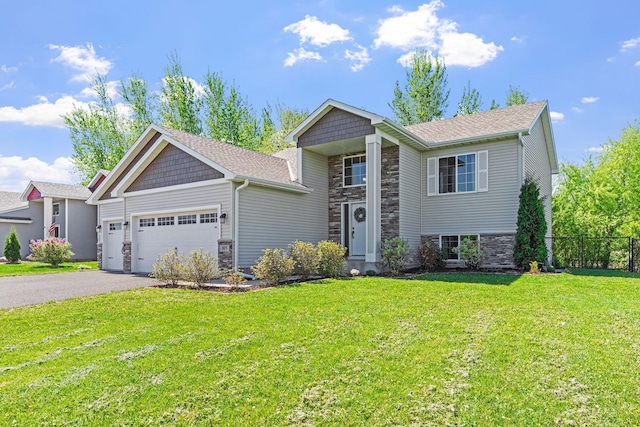 805 Cologne Ln, Waverly, MN 55390 - view of front of property featuring stone siding, a garage, and asphalt driveway