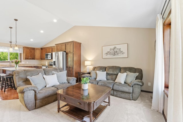 805 Cologne Ln, Waverly, MN 55390 - living room featuring vaulted ceiling, recessed lighting, and light carpet