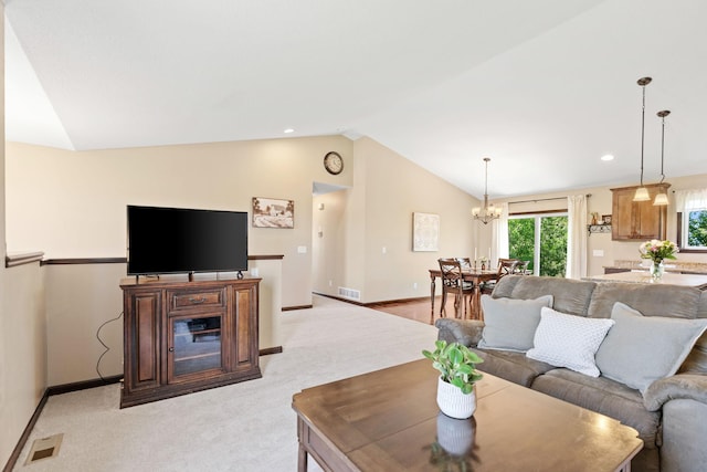 805 Cologne Ln, Waverly, MN 55390 - living room with lofted ceiling, baseboards, a chandelier, light carpet, and recessed lighting