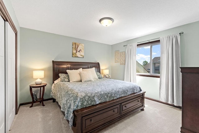 805 Cologne Ln, Waverly, MN 55390 - bedroom featuring light carpet, baseboards, and a closet