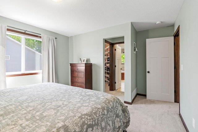 805 Cologne Ln, Waverly, MN 55390 - bedroom with carpet, a spacious closet, baseboards, and a closet