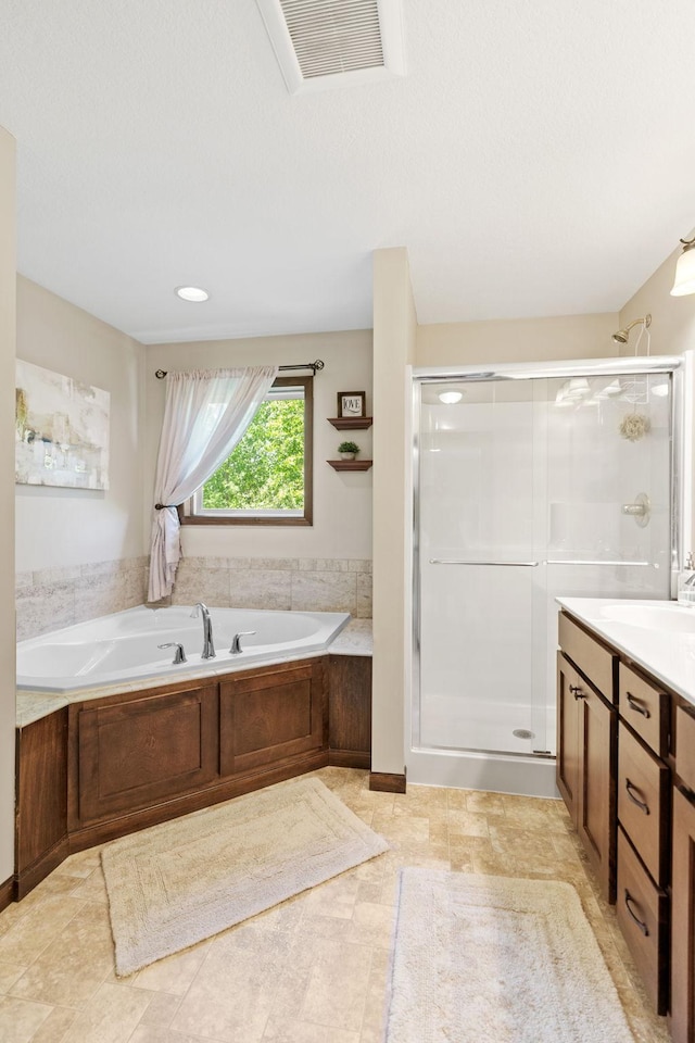 805 Cologne Ln, Waverly, MN 55390 - full bathroom featuring a shower stall, a bath, and vanity