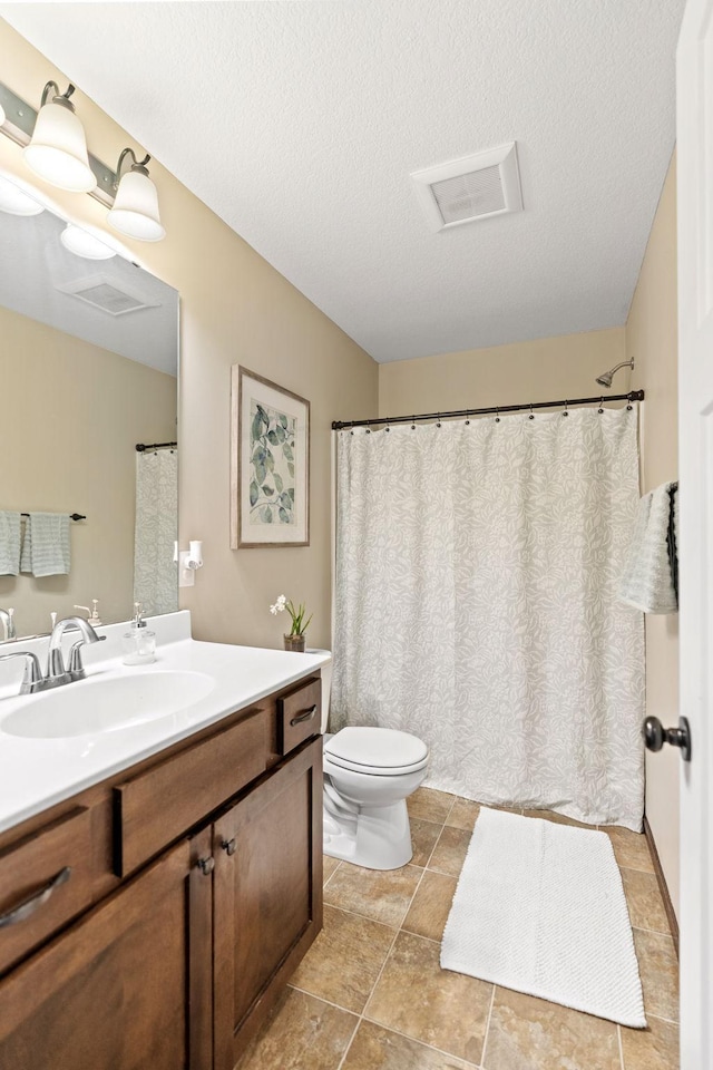 805 Cologne Ln, Waverly, MN 55390 - full bath with vanity, toilet, and a textured ceiling